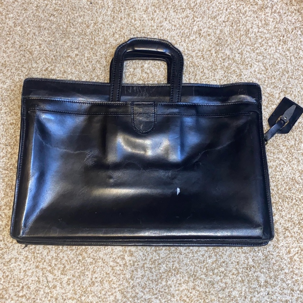 Hartmann black leather briefcase quiet luxury
